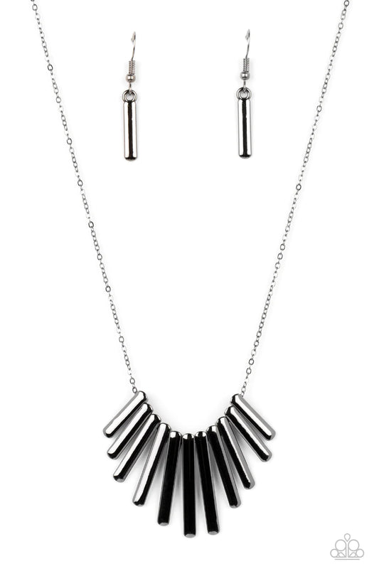 Paparazzi Accessories Leading MANE - Black A collection of high-sheen gunmetal frames glide along a dainty gunmetal chain below the collar, stacking into a bowing fringe for a monochromatic masterpiece. Features an adjustable clasp closure. Sold as one in