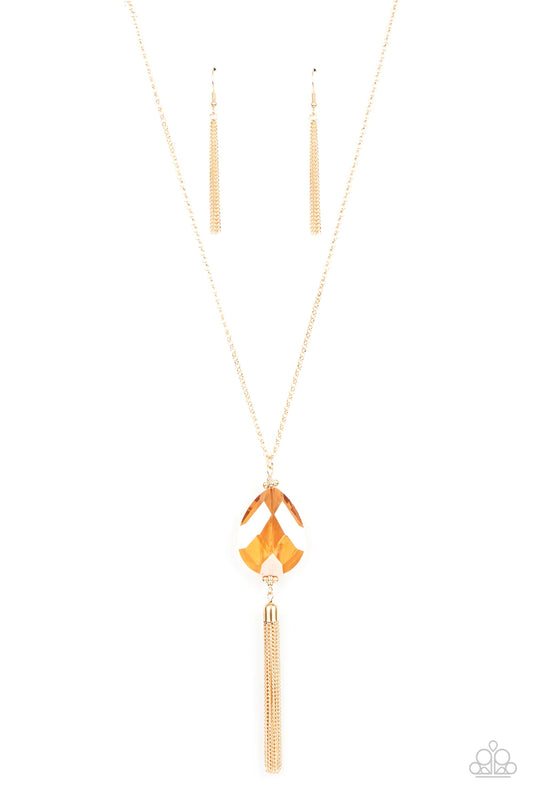 Paparazzi Accessories Interstellar Solstice - Gold Infused with a glistening gold chain tassel, an oversized golden teardrop gem swings from the bottom of a lengthened gold chain for a glamorously glitzy finish. Features an adjustable clasp closure. Sold