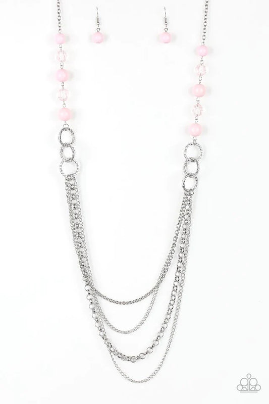Paparazzi Accessories Vividly Vivid - Pink Polished pink, faceted crystal-like and delicately hammered silver hoops give way to mismatched silver chains down the chest for a whimsical look. Features an adjustable clasp closure.