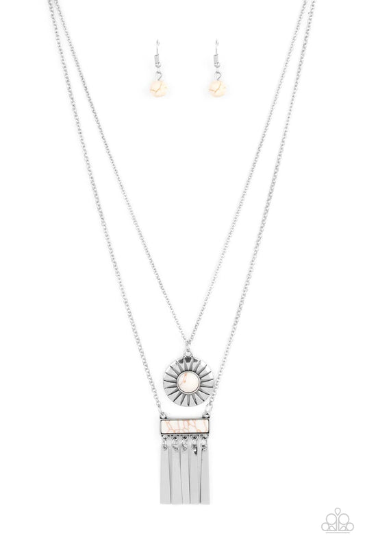 Paparazzi Accessories Sunburst Rustica - White Featuring rustic white stones, a double layer of pendants falls from lengthened silver chains. A round white stone is pressed into the center of a silver sunburst cutout frame. Dancing below, the second penda