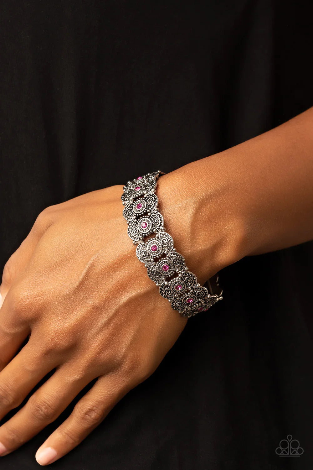 Paparazzi Accessories Rapturous Romance - Pink Dotted with sparkly pink rhinestones, pairs of studded and heart embossed patterned silver frames are threaded along stretchy bands around the wrist for a romantic fashion. Sold as one individual bracelet.