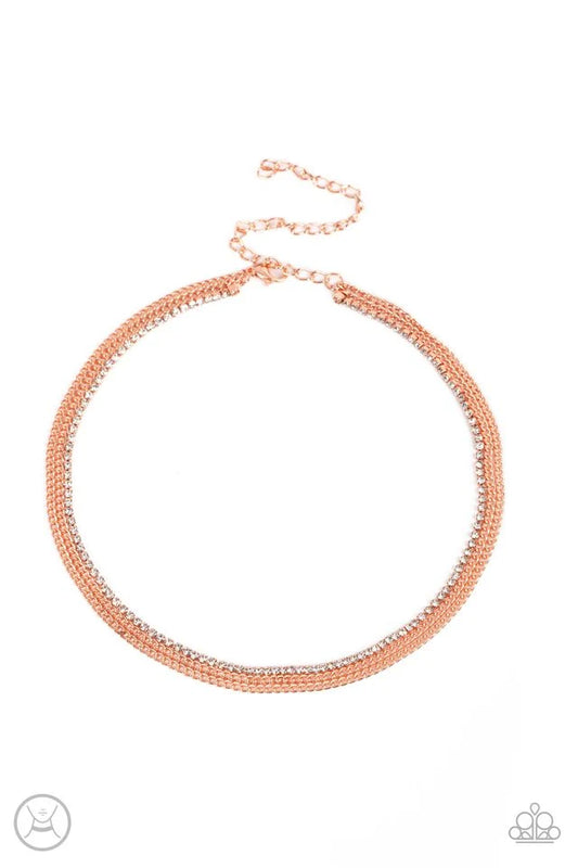Paparazzi Accessories Glitzy Gusto - Copper Two shiny copper chains and a single strand of dainty white rhinestones effortlessly layer around the neck, resulting in a radiant look. Features an adjustable clasp closure. Sold as one individual choker neckla