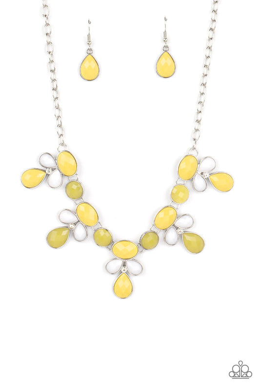 Paparazzi Accessories Midsummer Meadow - Yellow Featuring dizzying faceted finishes, a collection of oval, round, and teardrop shaped beads in vibrant shades of white and Primrose cluster into colorful frames around dainty white rhinestones. The whimsical
