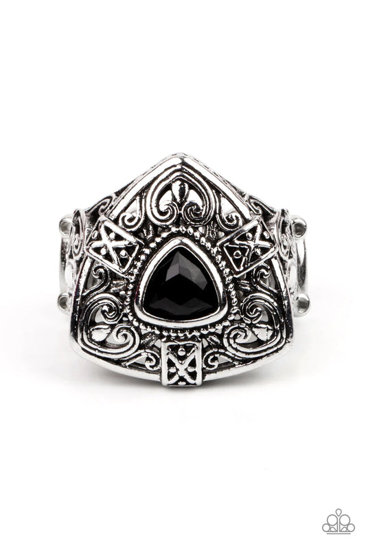 Paparazzi Accessories Charismatic Couture - Black A triangular cut black bead adorns the center of a decorative silver frame swirling with filigree details. The ornate centerpiece sits atop matching silver frames, coalescing into a regal band. Features a