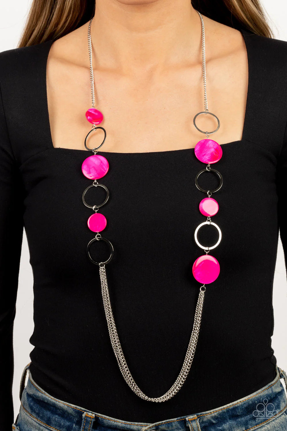 Paparazzi Accessories Beach Hub - Pink Sections of hot pink shell-like discs link with flat silver hoops down the chest, giving way to layers of shimmery silver chain for a tropical inspired flair. Features an adjustable clasp closure. Sold as one individ