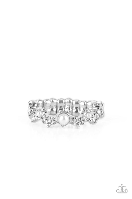 Paparazzi Accessories Blissfully Bella - White A dainty pearl bead encased in a classic silver pronged fitting is accompanied by sparkling white rhinestones and dotted pearl beads composing an exquisitely graceful fashion around the finger. Features a dai