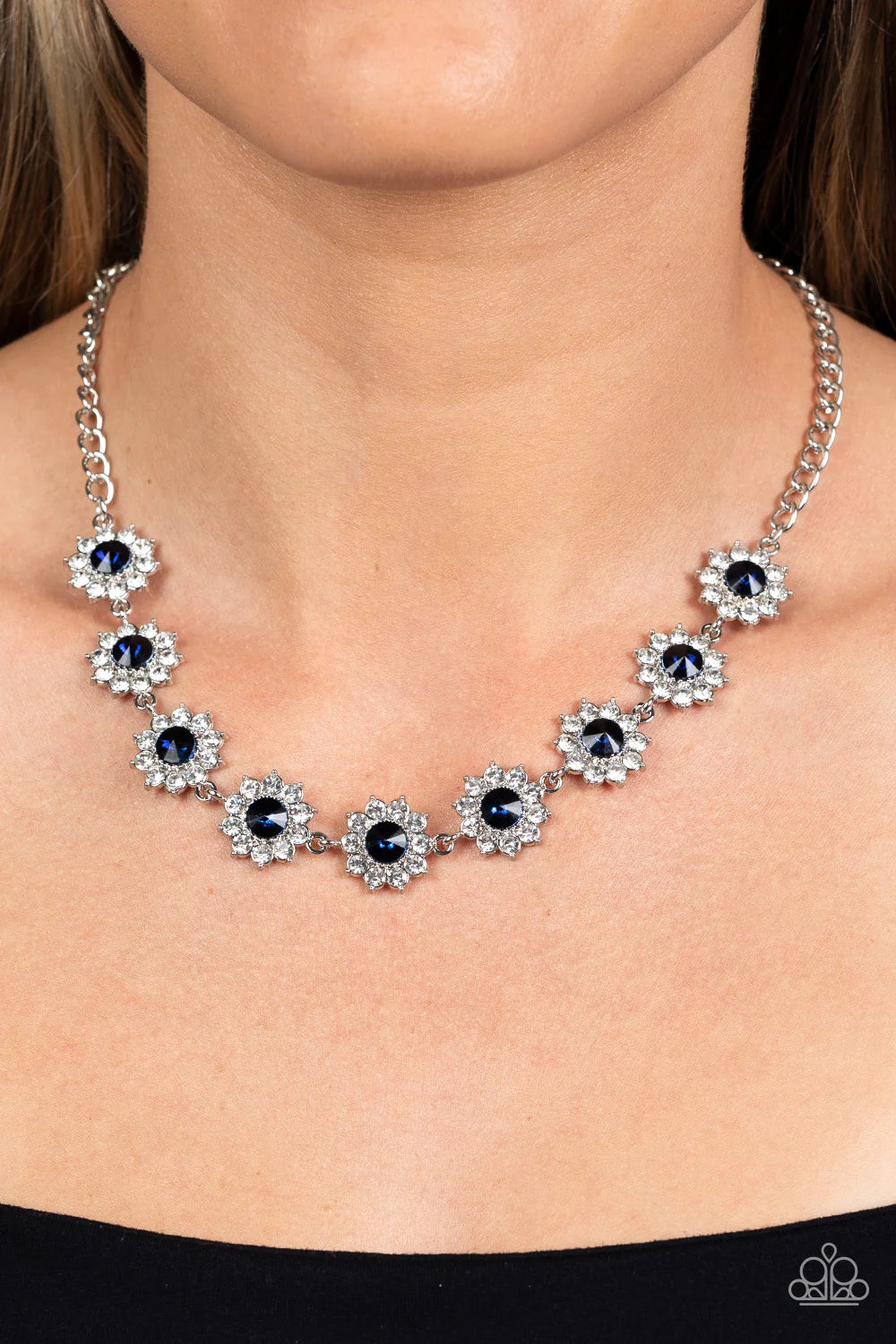 Paparazzi Accessories Blooming Brilliance - Blue Shiny white rhinestone petals bloom from a shimmery montana blue center, creating a whimsical floral arrangement below the collar. Sold as one individual paparazzi necklace. Jewelry