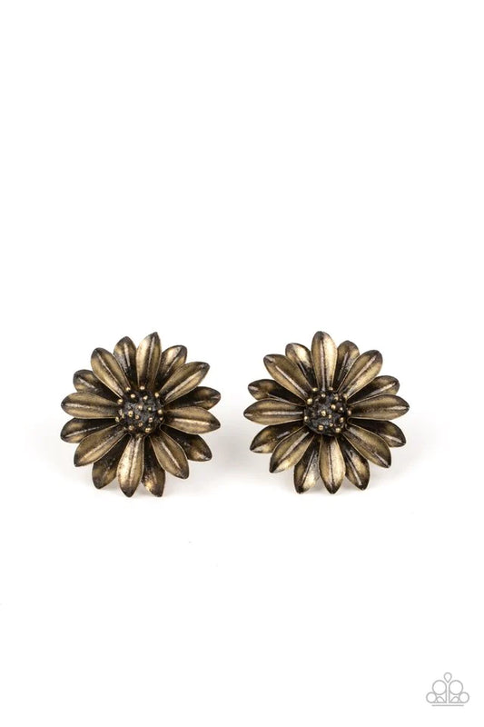 Paparazzi Accessories Daisy Dilemma - Brass Layers of burnished brass petals flare out from a brass studded center, blooming into a rustic floral fantasy. Earring attaches to a standard post fitting. Sold as one pair of post earrings. Jewelry