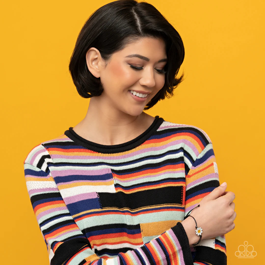 Paparazzi Accessories DAISY Little Thing - Black Held together and centered within soft black cording, a single daisy charm rests. Featuring a silver smiley face in its yellow center, this single flower provides a fashionably, minimalistic statement aroun