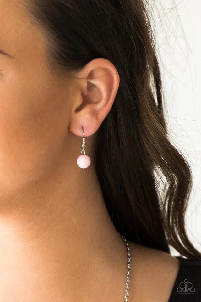 Paparazzi Accessories Vividly Vivid - Pink Polished pink, faceted crystal-like and delicately hammered silver hoops give way to mismatched silver chains down the chest for a whimsical look. Features an adjustable clasp closure.