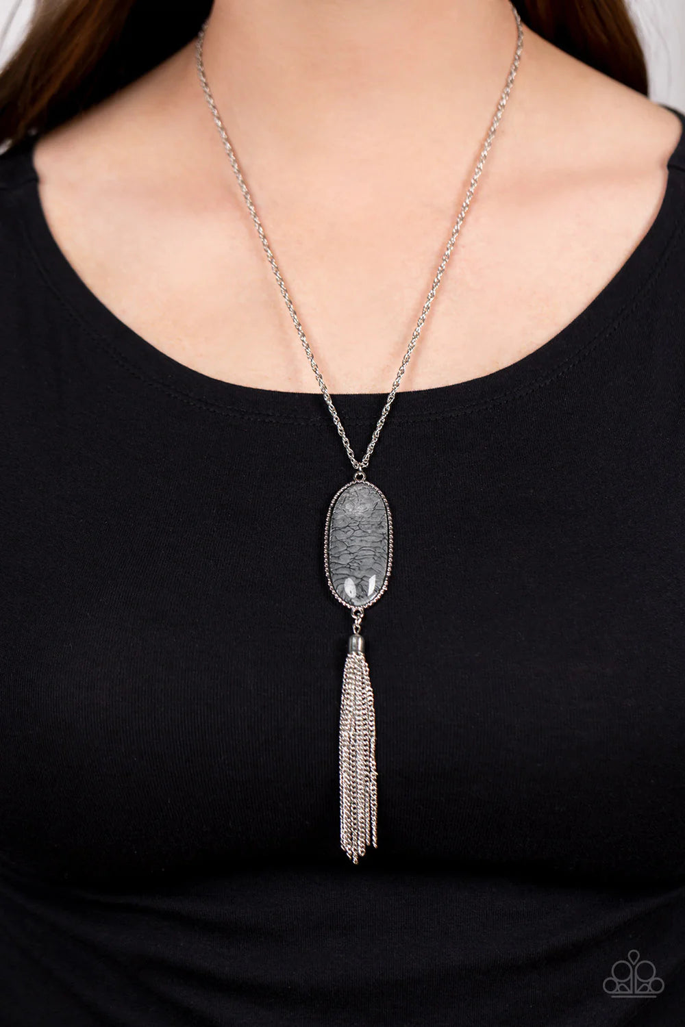 Paparazzi Accessories Southern Stroll - Silver Shimmery Northern Droplet lacquer-like paint swirls into a faux stone pattern inside of a glassy casing. The oblong pendant glides along a classic silver chain below the collar while a silver tassel dances fr