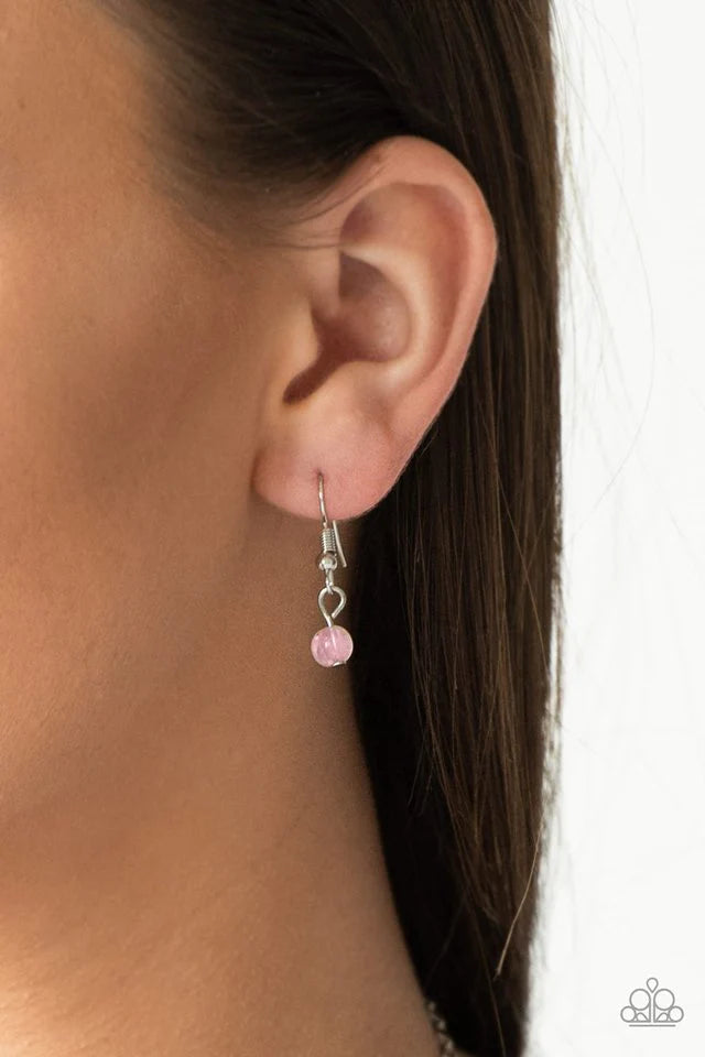 Paparazzi Accessories Colorful Cadence - Pink Faceted silver and glassy pink beads trickle along shimmery silver chains down the chest for a whimsical look. Features an adjustable clasp closure. Sold as one individual necklace. Includes one pair of matchi