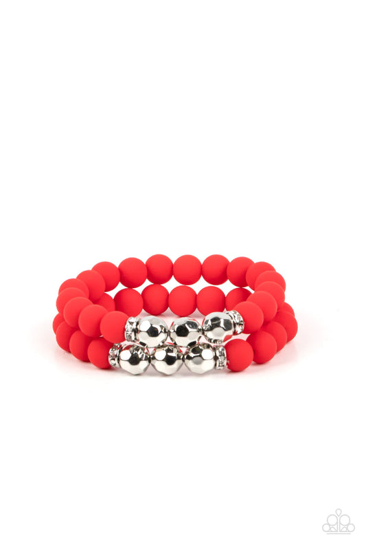 Paparazzi Accessories Dip and Dive - Red White rhinestone encrusted rings flank a trio of faceted silver beads along a stretchy row of matte-finished Poinciana beads, creating a summery splash of color around the wrist. Sold as one individual bracelet. Je