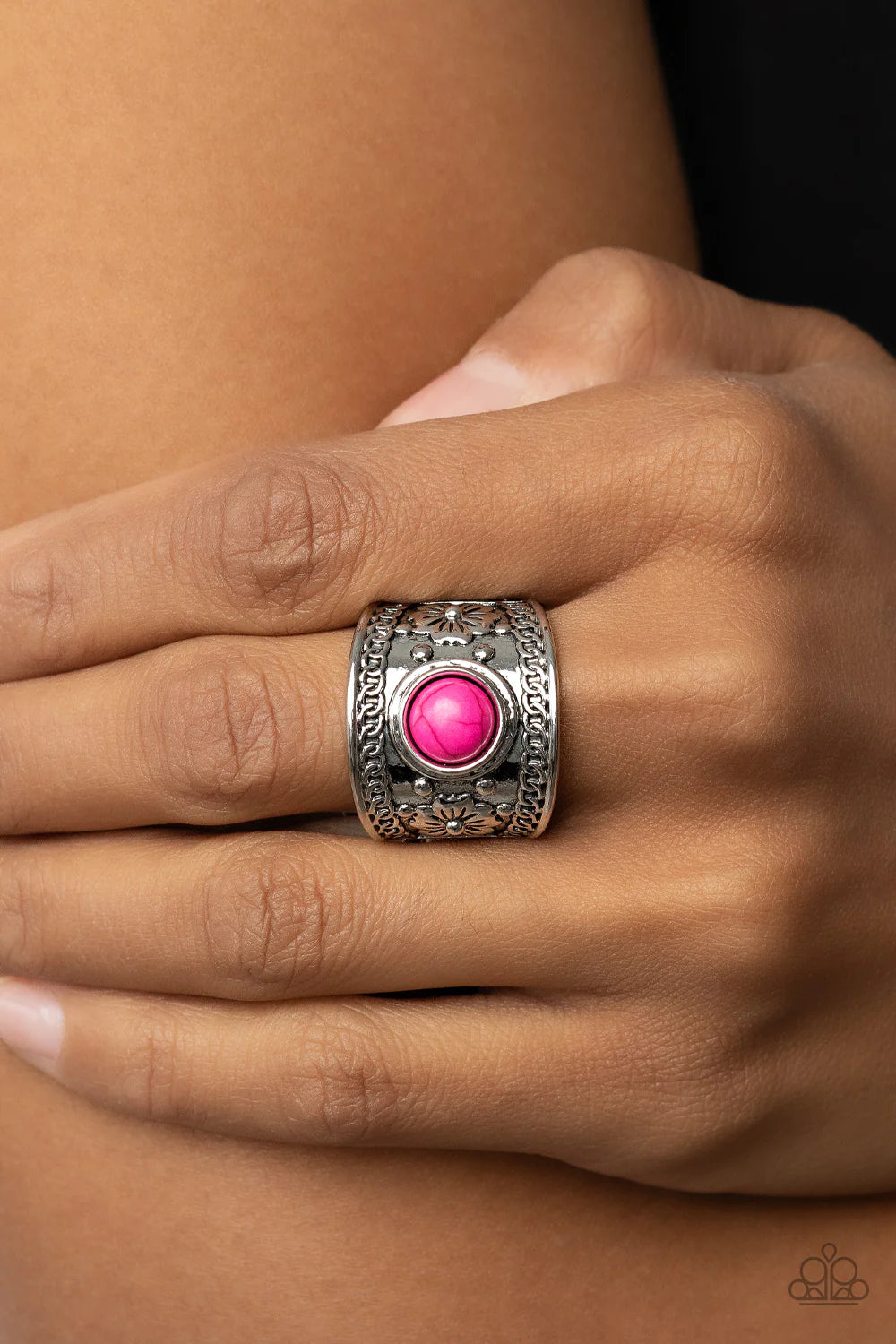 Paparazzi Accessories HAVEN-Sent - Pink Bordered in chain-like details, a thick silver frame is adorned with a vivacious pink stone that is flanked by whimsical floral accents for a seasonal flair. Features a stretchy band for a flexible fit. Sold as one