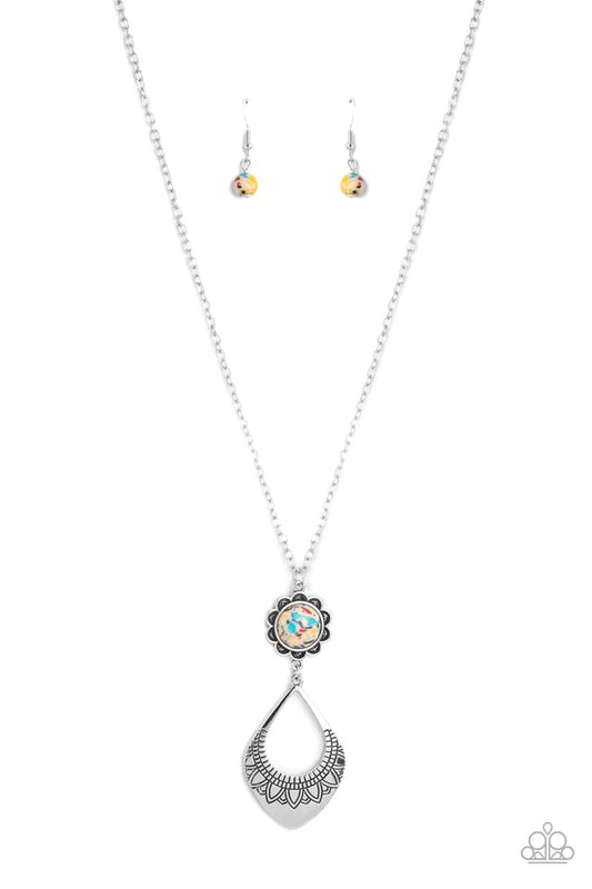 Paparazzi Accessories Stone Toll - Yellow Dangling from an elongated, silver link chain, two whimsical, interconnected shapes coalesce down the chest. An oversized pale yellow stone dotted with multicolored specks, is wrapped in a silver floral frame that