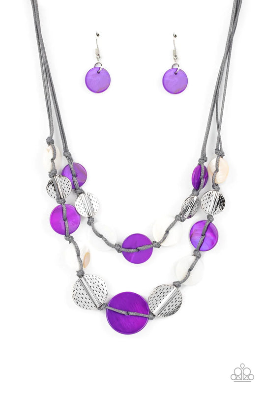 Paparazzi Accessories Barefoot Beaches - Purple Vibrant purple and white shells interlace with silver dotted, hammered discs to create a refined pop of color. Held together by soft gray cording, this piece will blend in with beaches near you! Features an