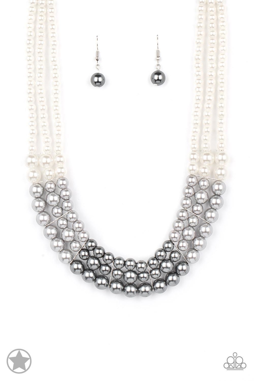 Paparazzi Accessories Lady In Waiting Strands of white, silver, and dark gray pearls elegantly drape below the collar, creating a beautiful ombre effect. Sectioned by silver accents, the luminescent pearls radiantly fall into a glamorous cascade. Features