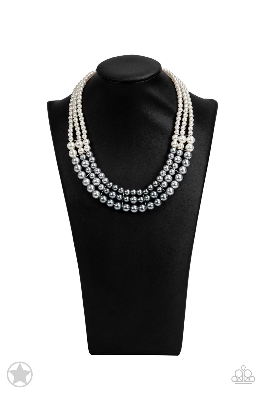 Paparazzi Accessories Lady In Waiting Strands of white, silver, and dark gray pearls elegantly drape below the collar, creating a beautiful ombre effect. Sectioned by silver accents, the luminescent pearls radiantly fall into a glamorous cascade. Features