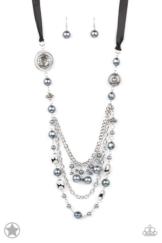 Paparazzi Accessories All The Trimmings - Black A silky black ribbon replaces a traditional chain to create a timeless look. Pearly dark gray beads and funky silver pieces intermix with varying lengths of silver chains to give a fresh take on a Victorian-