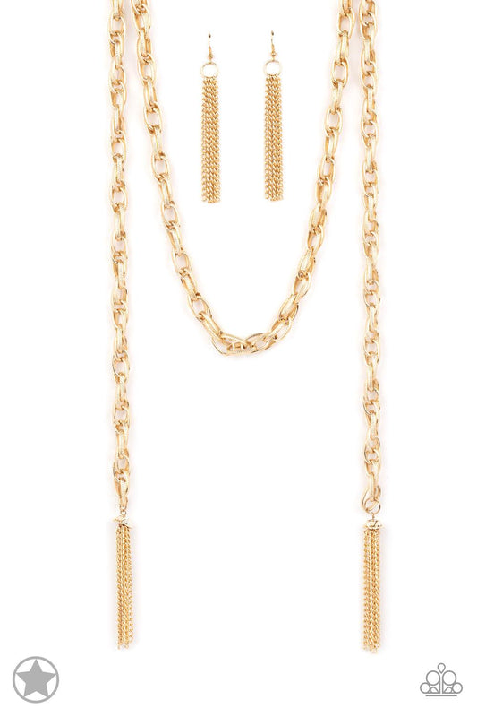 Paparazzi Accessories SCARFed for Attention - Gold A single strand of spiraling, interlocking links with light-catching texture is anchored by two tassels of chain that add dramatic length to the piece. Undeniably the most versatile piece in Paparazzi's h