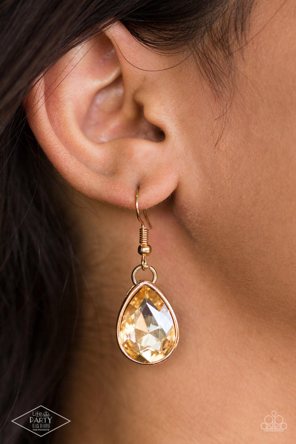 Paparazzi Accessories Show-Stopping Shimmer - Gold Joined by dainty gold links, two rows of dramatic gold chain layer below the collar in a fierce fashion. Golden teardrops drip from the glistening layers, adding a timeless shimmer to the show-stopping pi