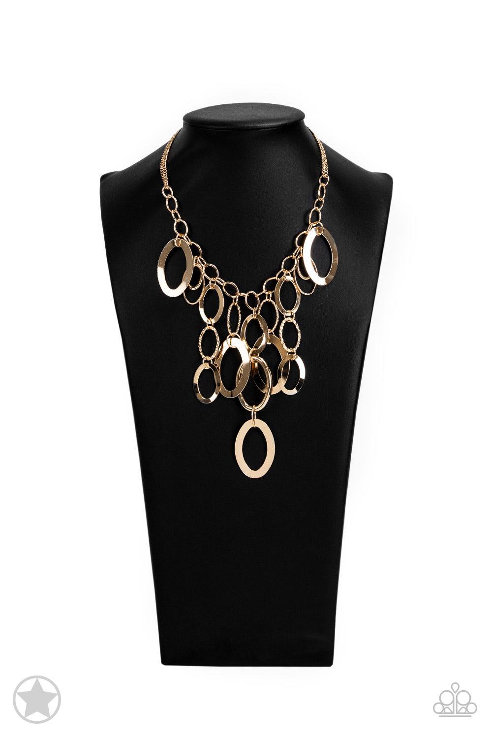 Paparazzi Accessories A Golden Spell - Gold Large gold links and shimmering textured gold rings cascade below a gold chain freely, allowing for movement that makes a bold statement. Features an adjustable clasp closure. Sold as one individual necklace. In