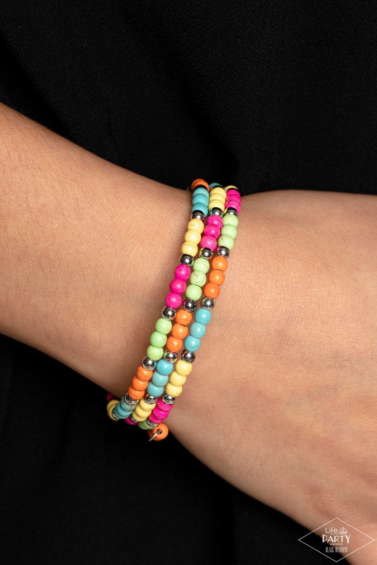 Paparazzi Accessories Stone Paradise - Multi Dainty silver beads and smooth multicolored stone accents are threaded along a coiled wire, creating an earthy infinity wrap style bracelet. As the stone elements in this piece are natural, some color variation