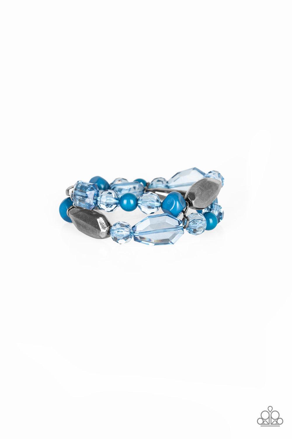 Paparazzi Accessories Rockin Rock Candy - Blue Mismatched gunmetal, polished blue, and crystal-like beads are threaded along interlocking stretchy bands for a whimsical look. Sold as one individual bracelet. Bracelets