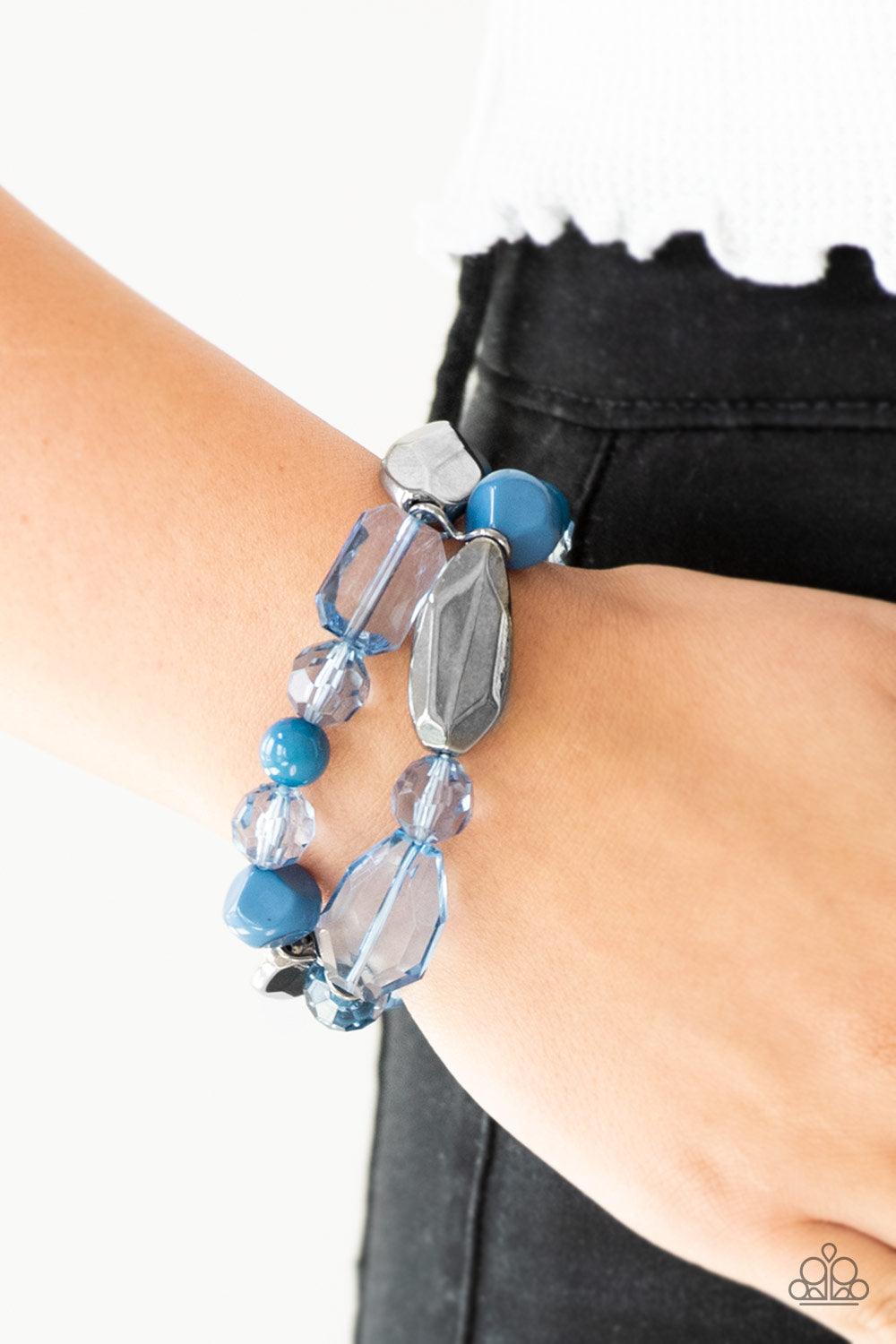 Paparazzi Accessories Rockin Rock Candy - Blue Mismatched gunmetal, polished blue, and crystal-like beads are threaded along interlocking stretchy bands for a whimsical look. Sold as one individual bracelet. Bracelets