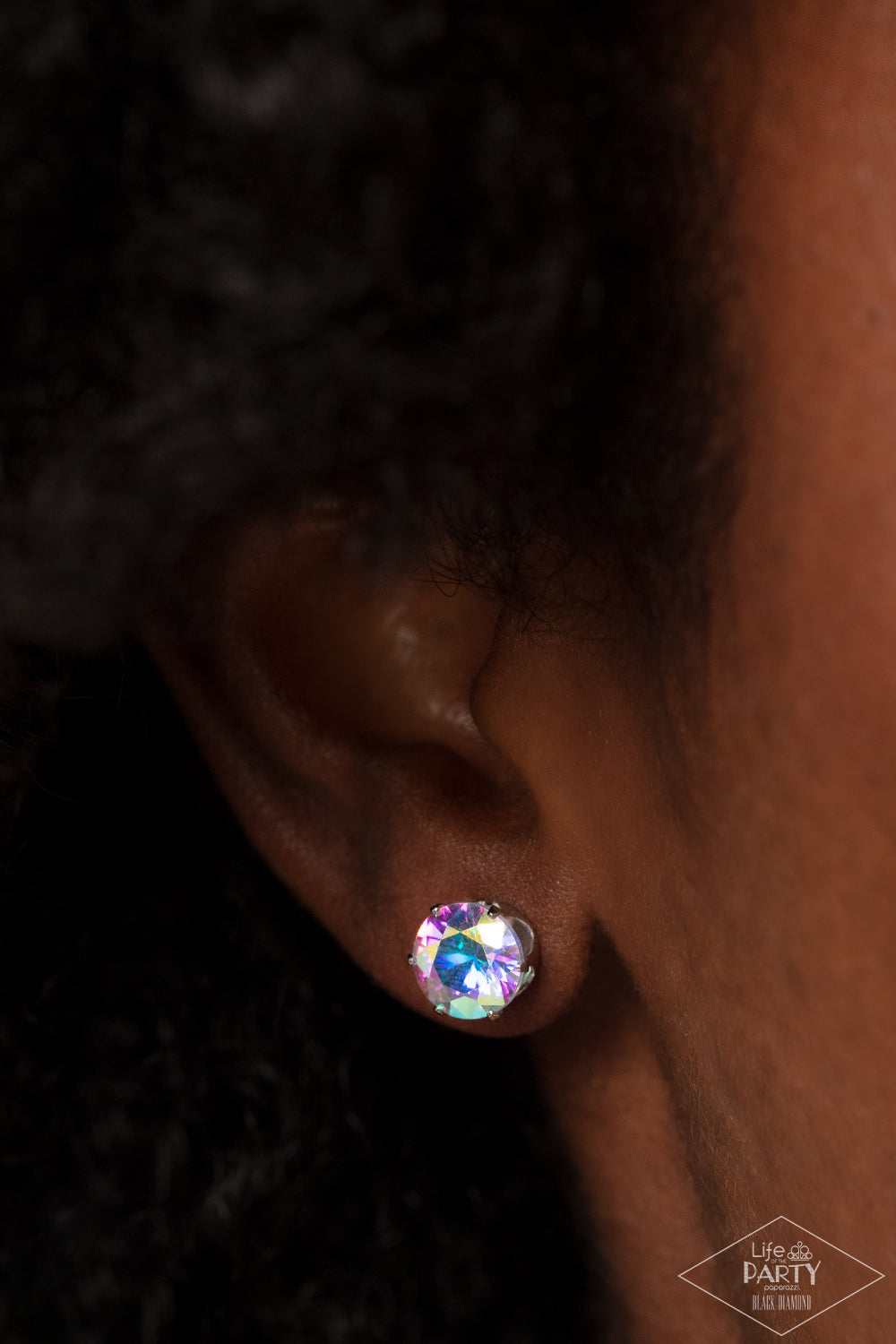 Paparazzi Accessories Come Out On Top - Multi A glassy iridescent rhinestone is nestled inside of a shimmery silver frame for a timeless look. Earring attaches to a standard post fitting. Due to its prismatic palette, color may vary. Sold as one pair of p