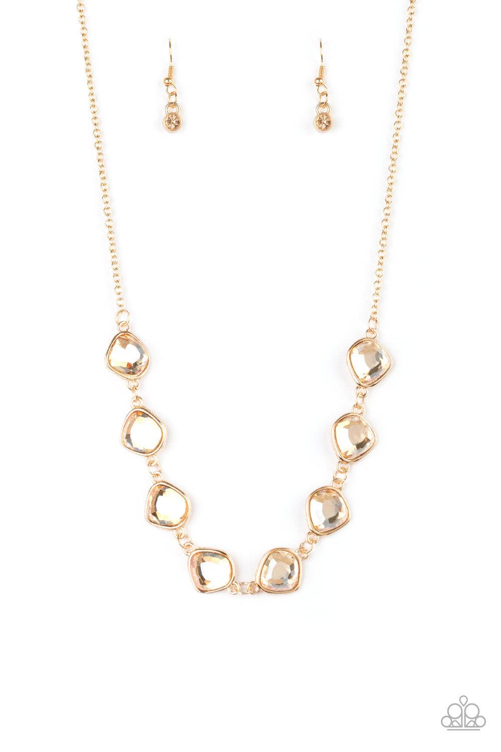 Paparazzi Accessories The Imperfectionist - Gold Featuring shimmery gold frames, imperfect golden gems link below the collar for a glamorous vintage inspired look. Features an adjustable clasp closure. Sold as one individual necklace. Includes one pair of