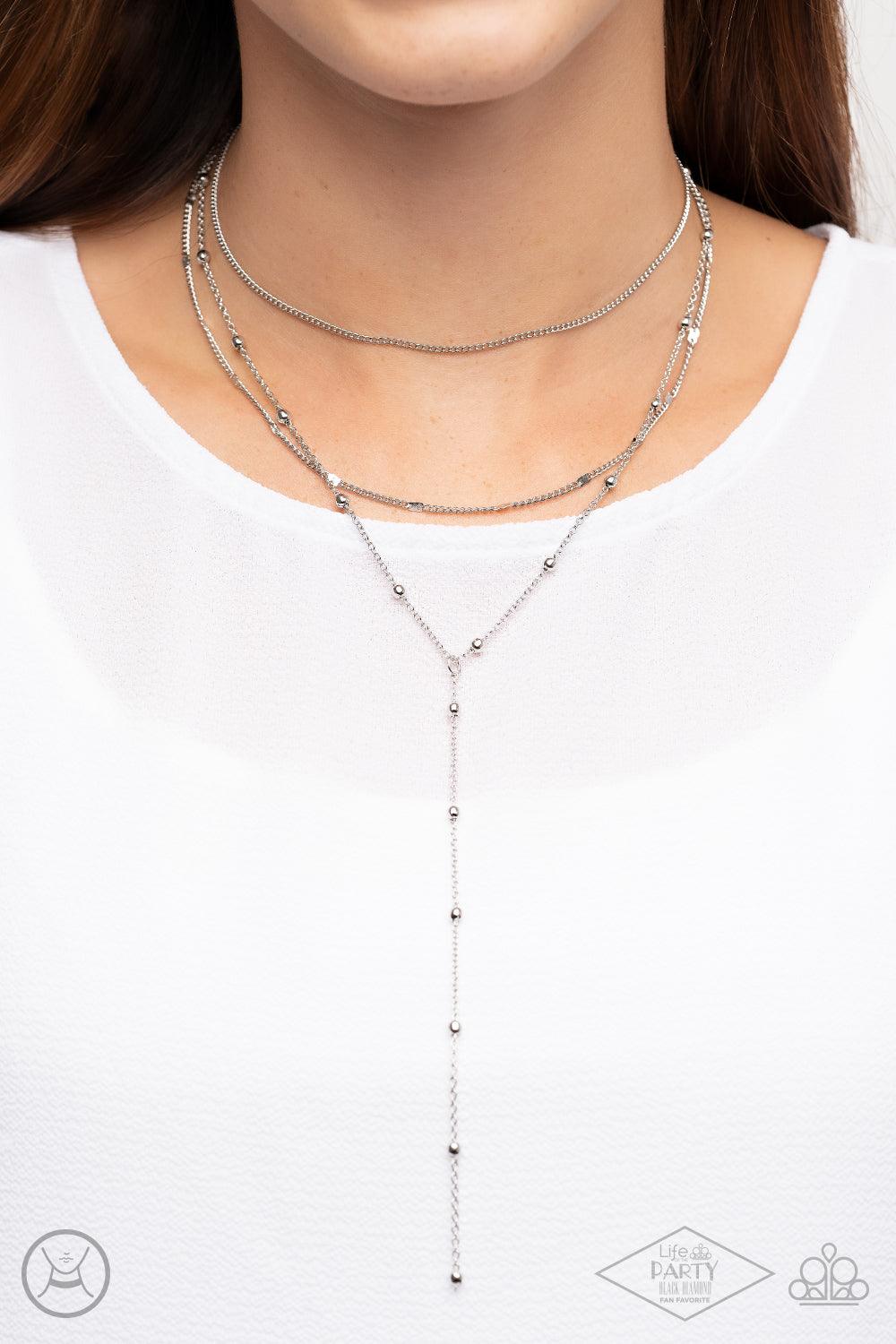 Paparazzi Accessories Think Like A Minimalist - Silver A row of beaded silver chain, a plain silver chain, and a chain featuring flattened links layer around the neck for a minimalist inspired look. An extended silver beaded chain drips from the center of