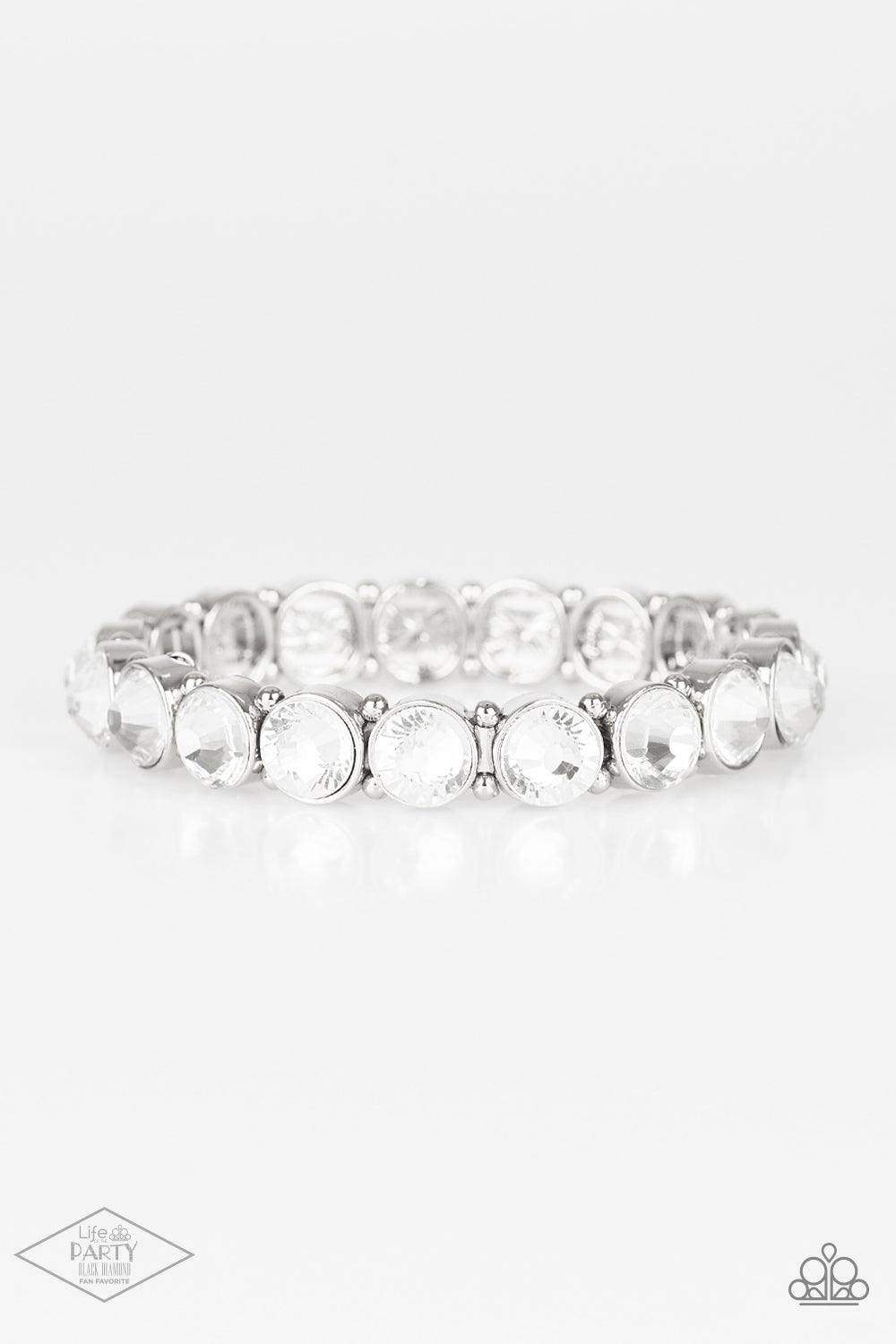 Paparazzi Accessories Sugar-Coated Sparkle - White Infused with dainty silver beads, glassy white rhinestone encrusted frames are threaded along stretchy bands around the wrist for a glamorous look. Sold as one individual bracelet. This Fan Favorite is ba