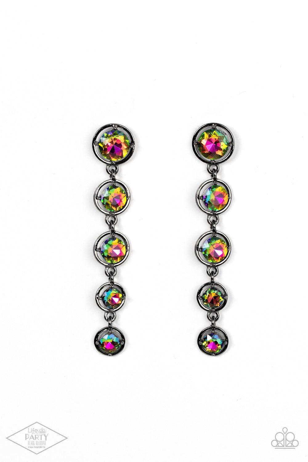 Paparazzi Accessories Drippin In Starlight - Multi Featuring sleek gunmetal fittings, faceted rainbow gems gradually decrease as they trickle from the ear for a glamorous look. Earring attaches to a standard post fitting. Sold as one pair of post earrings