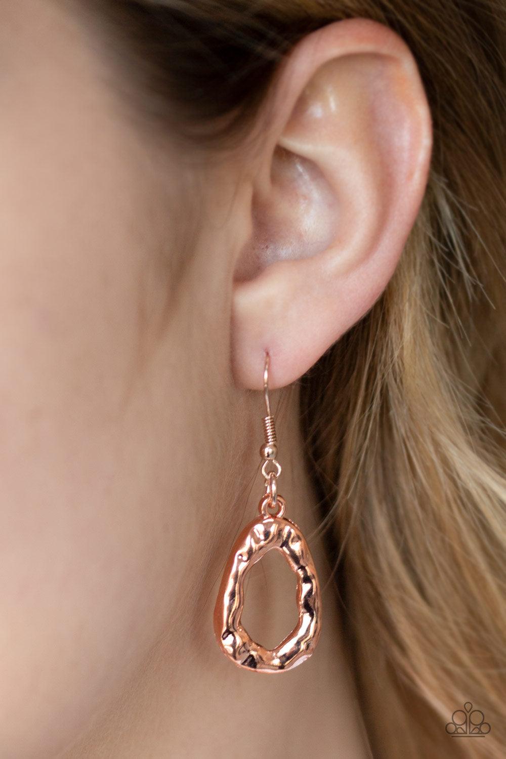Paparazzi Accessories Terra Couture - Copper Delicately hammered in blinding shimmer, shiny copper bars spin into asymmetrical teardrops. The airy abstract frames link into a bold industrial statement piece below the collar. Features an adjustable clasp c
