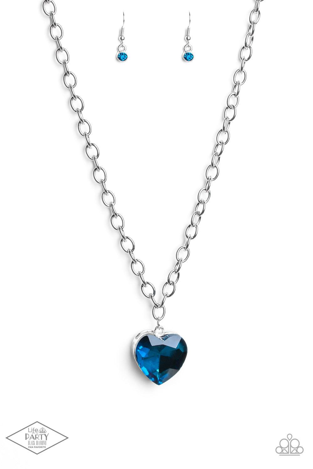 Paparazzi Accessories Flirtatiously Flashy - Blue Set atop a sleek silver fitting, a glittery blue heart-shaped gem swings from the bottom of a classic silver chain below the collar for a whimsical look. Features an adjustable clasp closure. Sold as one i