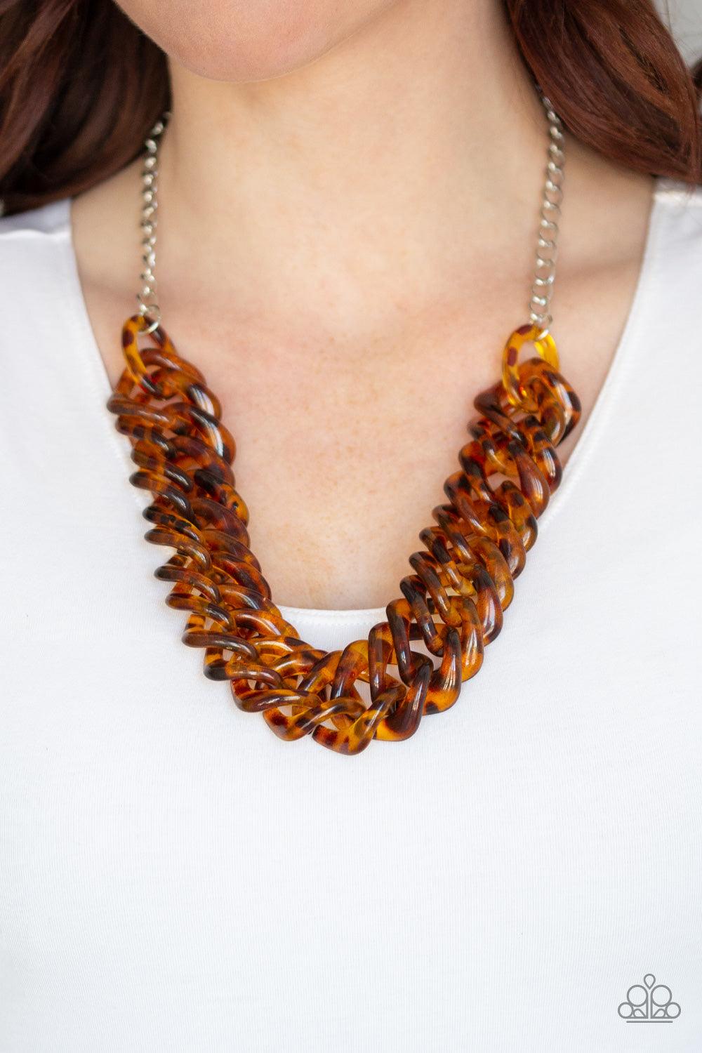 Paparazzi Accessories Comin In HAUTE - Brown Featuring a tortoise shell finish, square brown acrylic links subtlety twist as they link below the collar for a colorful statement-making look. Features an adjustable clasp closure. Sold as one individual neck