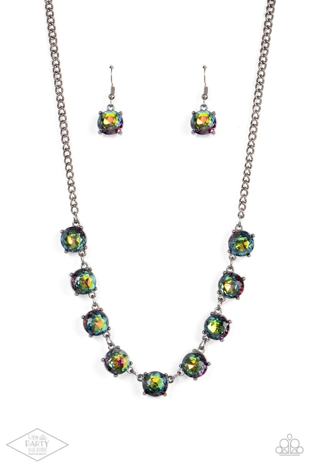 Paparazzi Accessories Iridescent Icing - Multi Featuring oil spill centers and sleek gunmetal fittings, a collection of oversized rhinestones link below the collar for an icy look. Features an adjustable clasp closure. Sold as one individual necklace. Inc