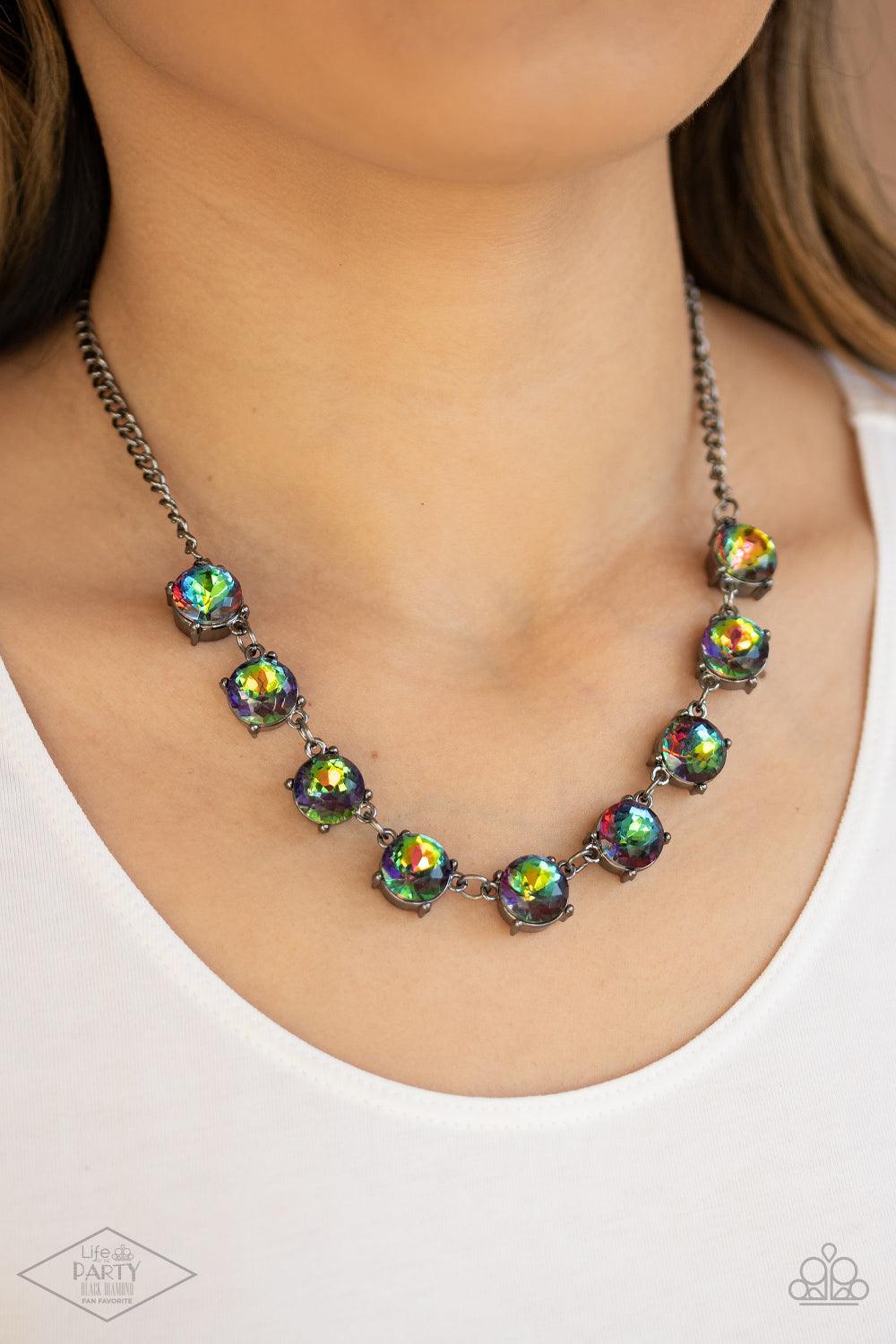 Paparazzi Accessories Iridescent Icing - Multi Featuring oil spill centers and sleek gunmetal fittings, a collection of oversized rhinestones link below the collar for an icy look. Features an adjustable clasp closure. Sold as one individual necklace. Inc