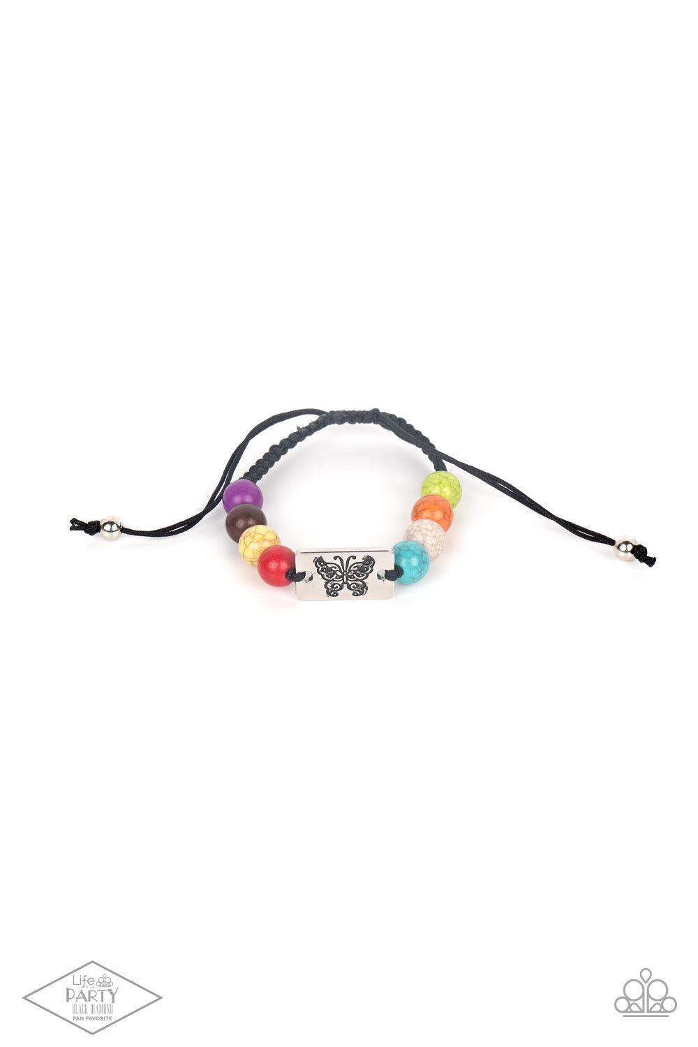 Paparazzi Accessories The Butterfly Effect A butterfly engraved on a metal rectangle plate sits in the center of a string of multicolored marble-like stones finished in a smooth cracked surface. The earthy colored stones combined with the worn metal butte