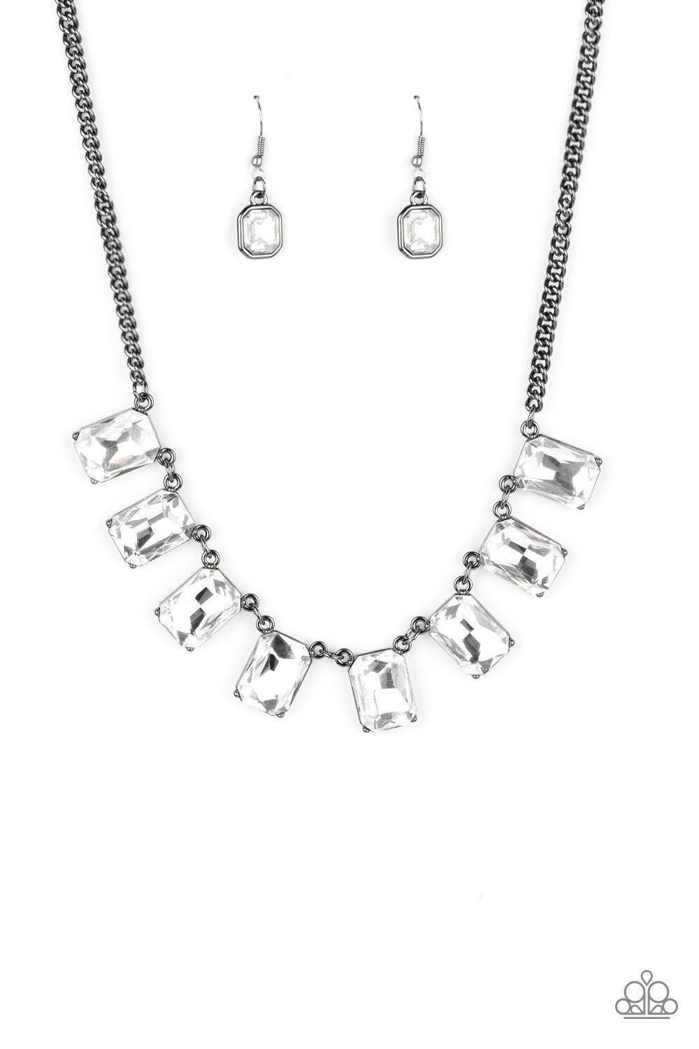 Paparazzi Accessories After Party Access - Black Encased in sleek gunmetal fittings, a regal chain of oversized white emerald style gems link below the collar for a timeless finish. Features an adjustable clasp closure. Sold as one individual necklace. In
