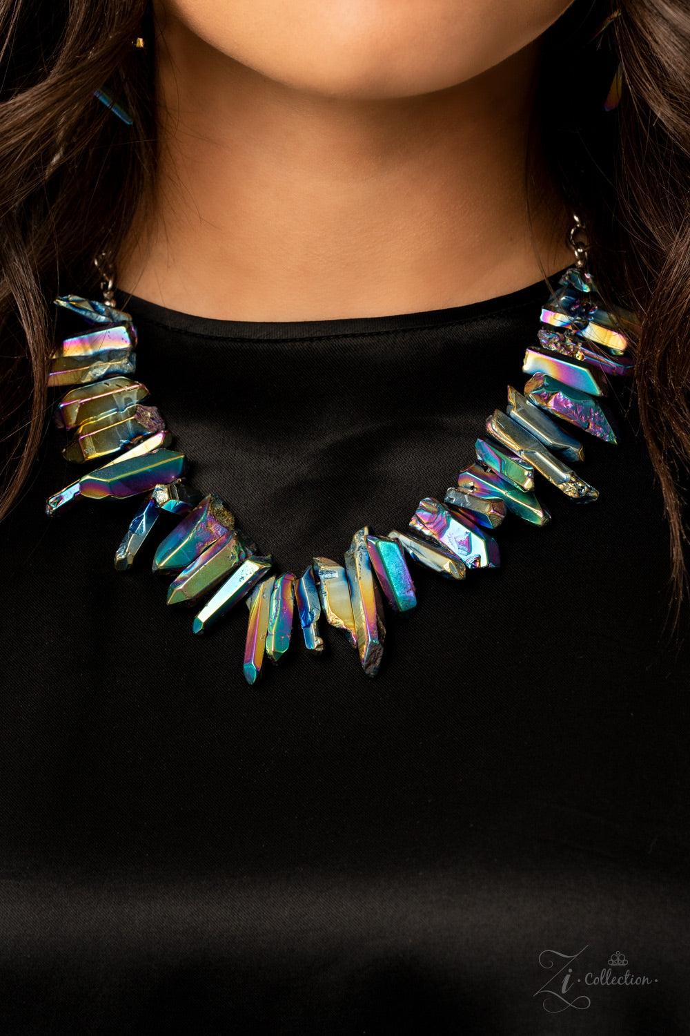 Paparazzi Accessories Charismatic Featuring an oil spill iridescence, raw cut pieces of hematite are threaded along an invisible wire below the collar for a colorfully courageous look. Features an adjustable clasp closure. Sold as one individual necklace.