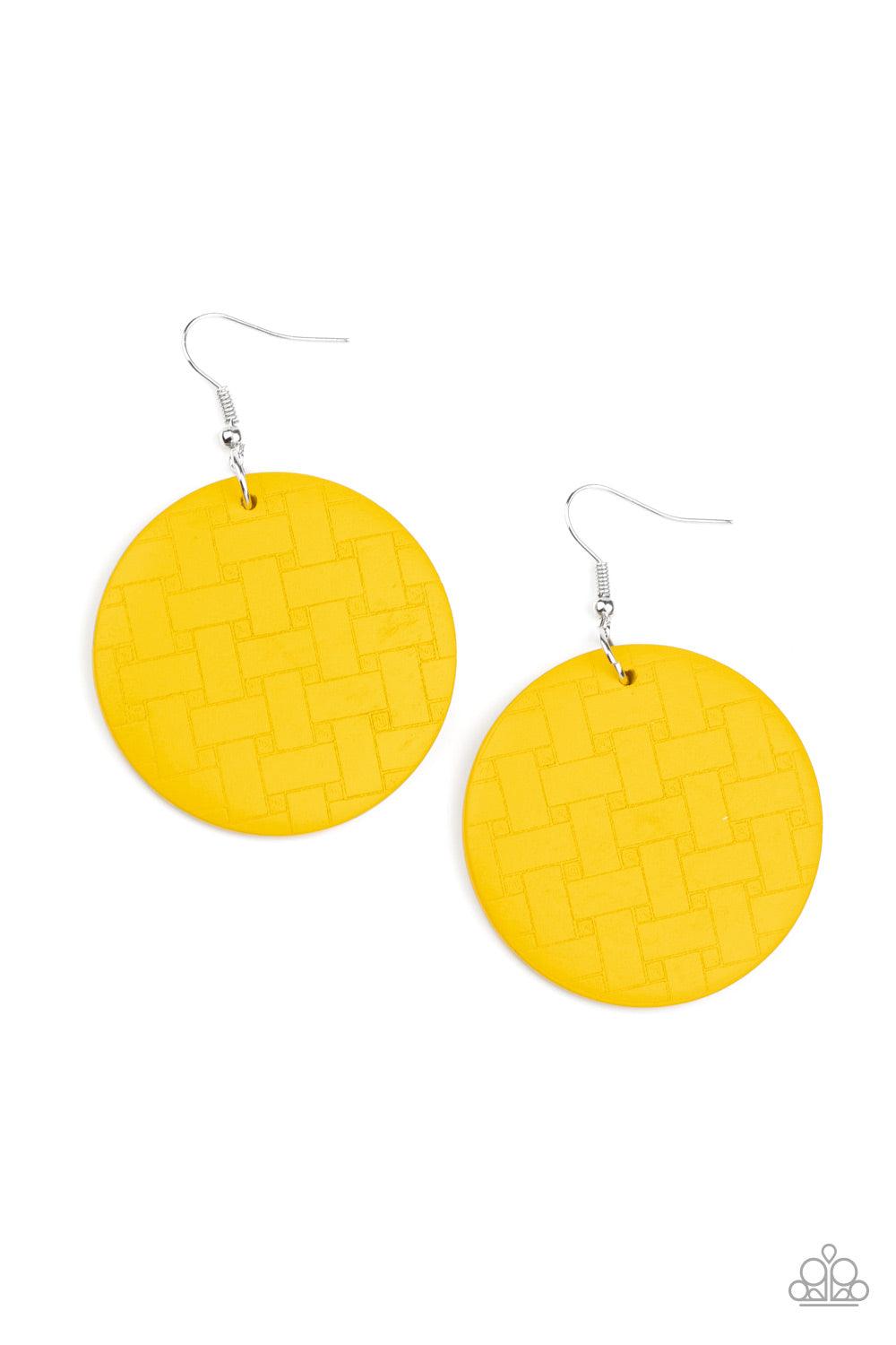 Paparazzi Accessories Natural Novelty - Yellow Engraved in a woven geometric pattern, an earthy yellow wooden disc swings from the ear for a natural-inspired look. Earring attaches to a standard fishhook fitting. Sold as one pair of earrings. Jewelry
