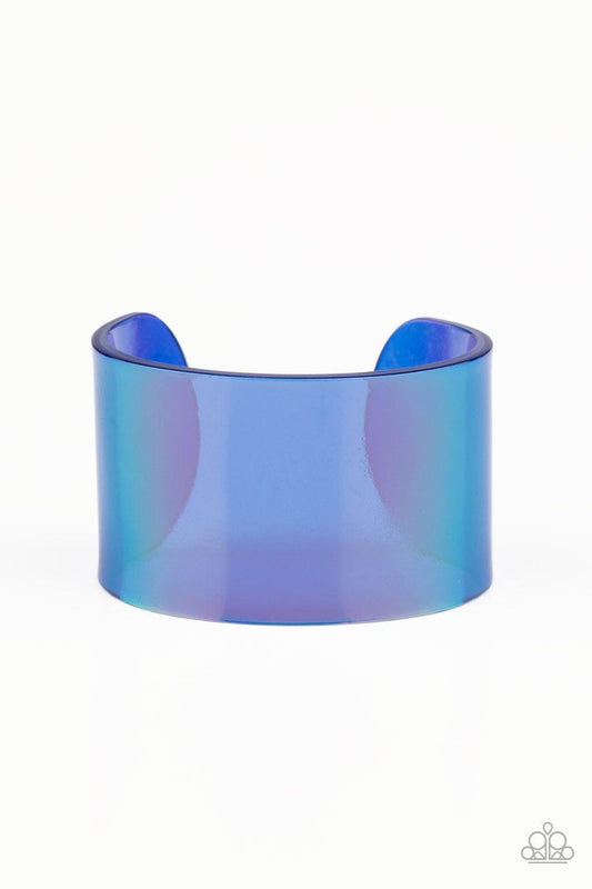 Paparazzi Accessories Holographic Aura - Blue Featuring a holographic shimmer, a thick blue acrylic cuff wraps around the wrist for a retro inspired fashion. Sold as one individual bracelet. Jewelry