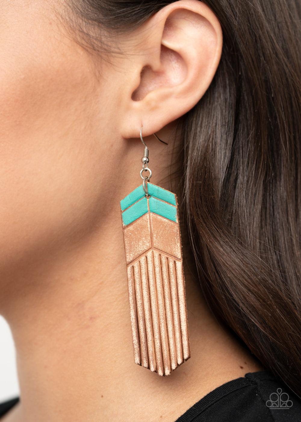 Paparazzi Accessories Desert Trails - Blue Painted in turquoise chevron-like details, a distressed leather frame is spliced into tasseled ends, creating an earthy fringe. Earring attaches to a standard fishhook fitting Sold as one pair of earrings. Jewelr