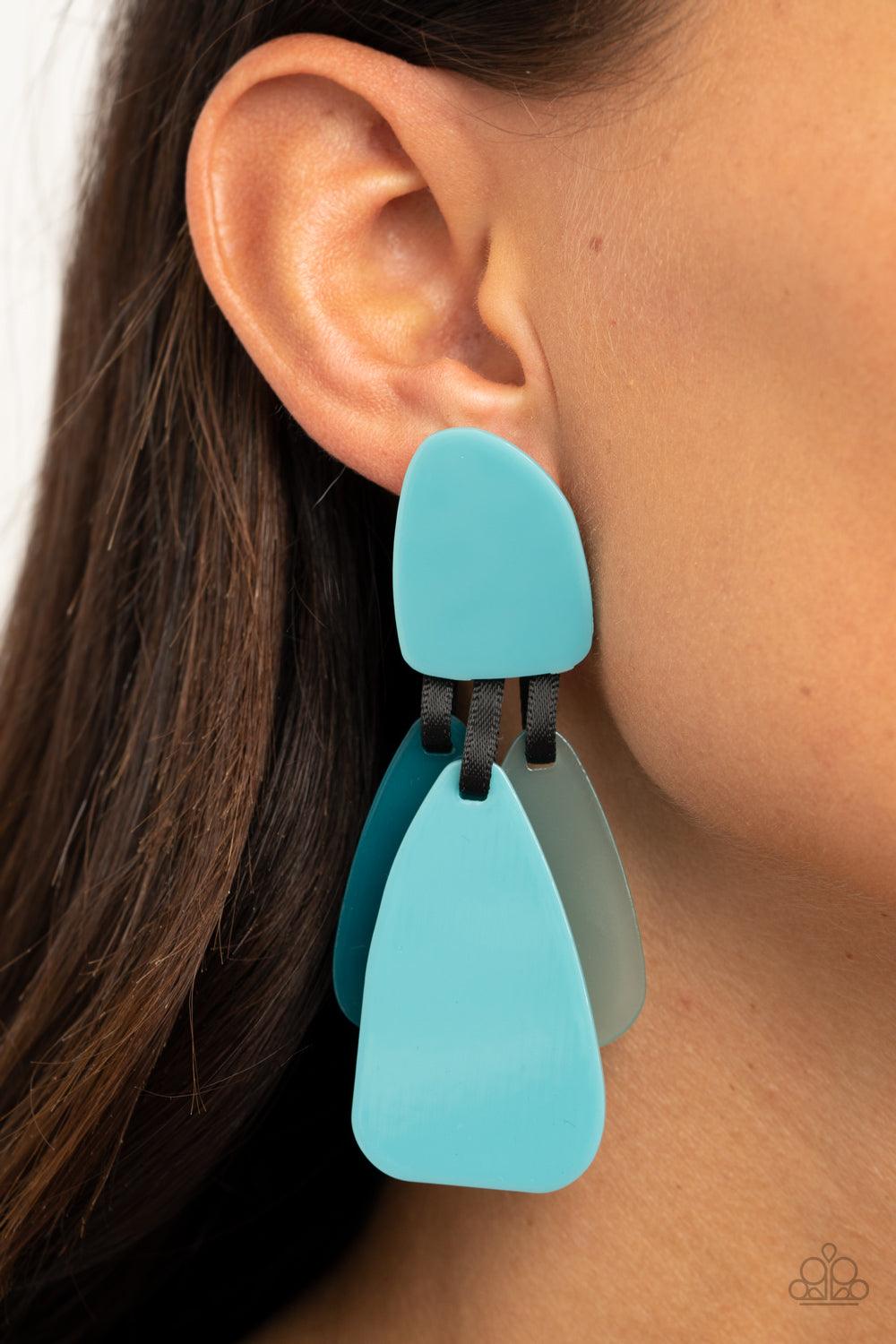 Paparazzi Accessories All FAUX One - Blue Varying in color and opacity, a refreshing collection of asymmetrically teardrop acrylic frames hang from shiny black ribbons at the bottom of a matching acrylic frame for a colorfully retro finish. Earring attach