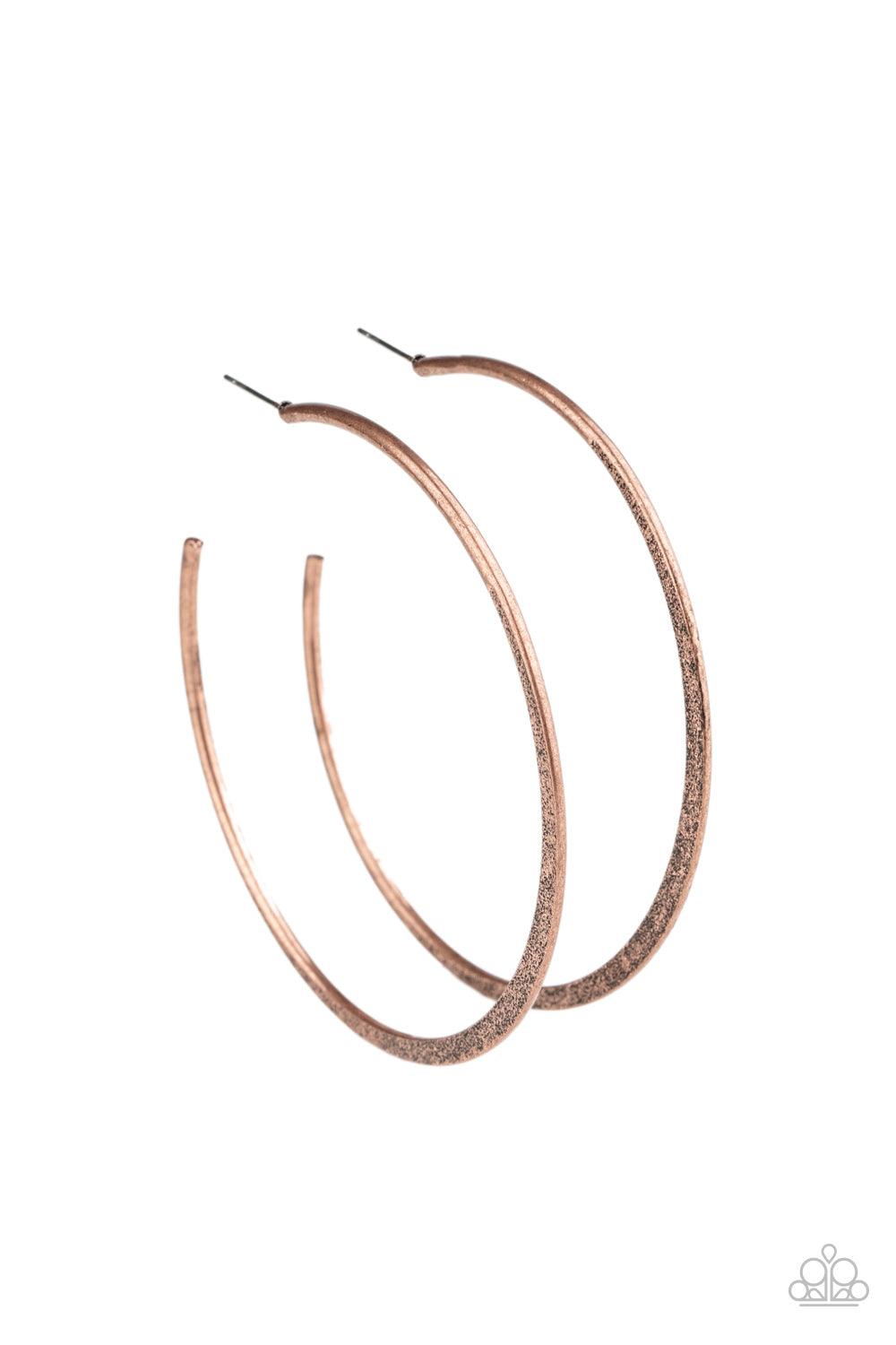 Paparazzi Accessories Flat Spin - Copper The bottom of an oversized copper hoop is flattened and hammered in shimmery rustic textures for a glistening finish. Earring attaches to a standard post fitting. Hoop measures approximately 2 3/4" in diameter. Sol