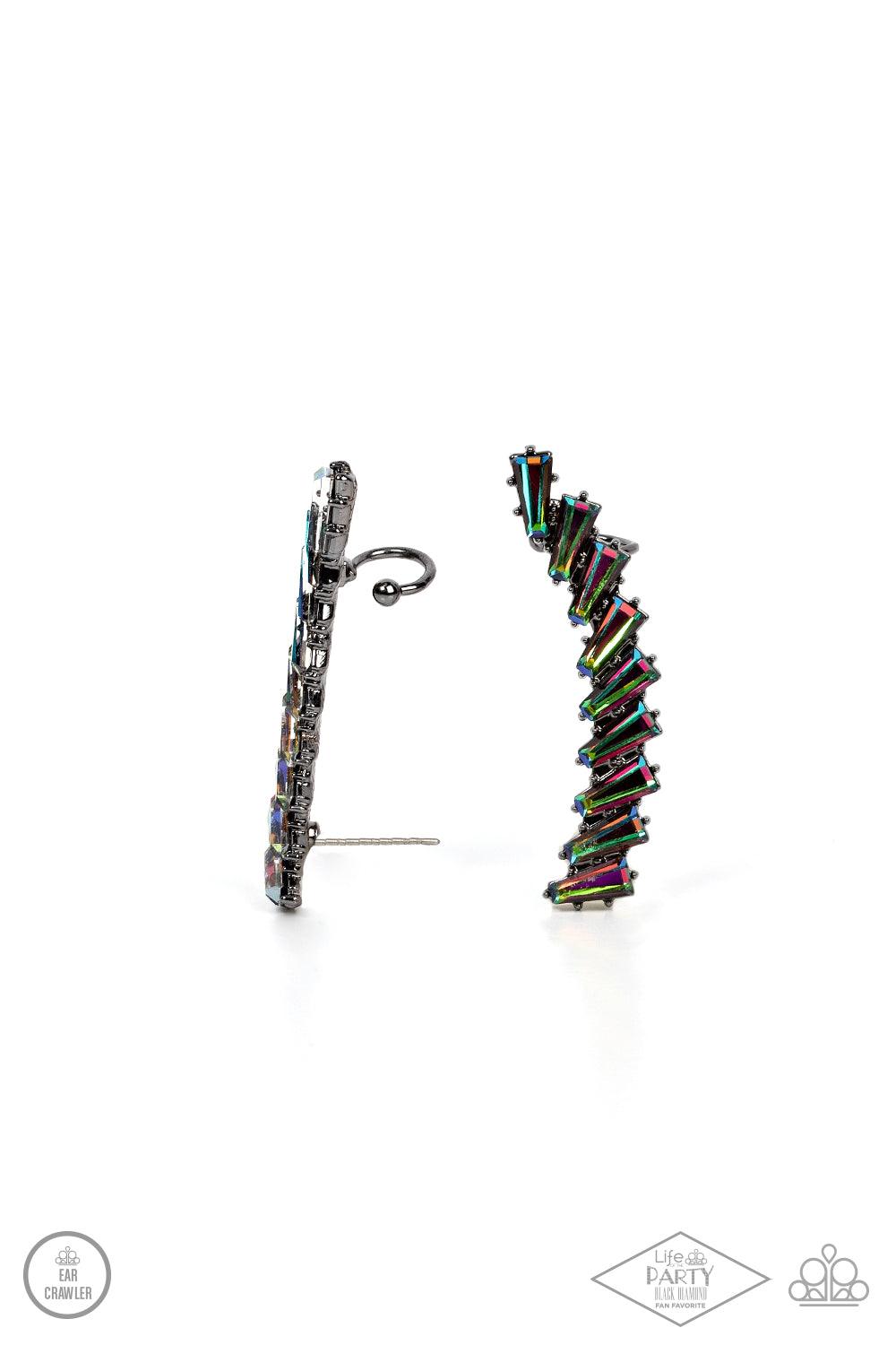 Paparazzi Accessories I Think ICE Can - Multi An icy stack of oil spill rhinestone gems climb the ear, coalescing into a shockingly sparkly frame. Earring attaches to a standard post fitting. Features a dainty cuff attached to the top for a secure fit. So