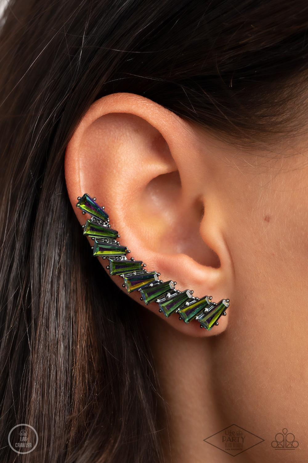 Paparazzi Accessories I Think ICE Can - Multi An icy stack of oil spill rhinestone gems climb the ear, coalescing into a shockingly sparkly frame. Earring attaches to a standard post fitting. Features a dainty cuff attached to the top for a secure fit. So