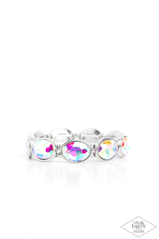 Paparazzi Accessories Diva In Disguise - Multi Glittery iridescent gems are pressed into sleek silver frames. Infused with dainty silver beads, the sparkly frames are threaded along stretchy bands for a glamorous look around the wrist. Due to its prismati